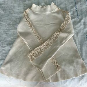 White embroidered sweater. S. Knitted and Knotted/Anthropologie.